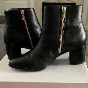 Gently used, black Calvin Klein boots